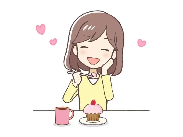 甘いものを食べる女性