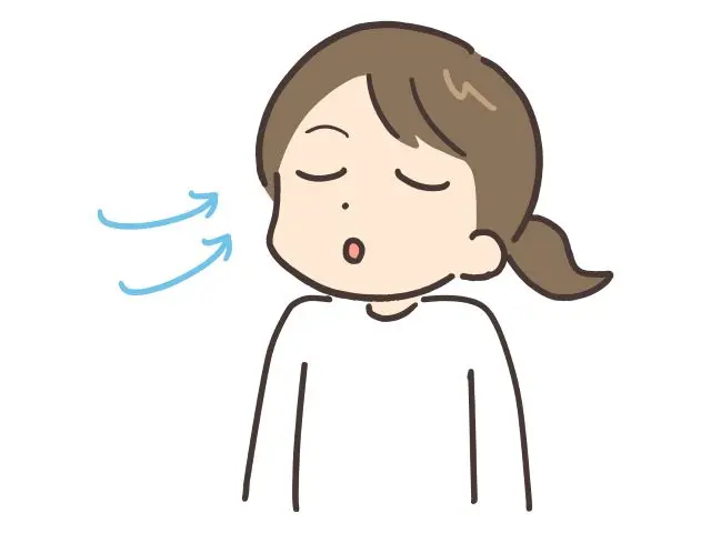女性が深呼吸をしている図